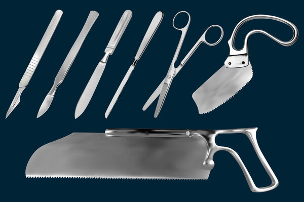 Set of surgical cutting tools. Reusable scalpel, scalpel with removable blade, Liston amputation knife , metacarpal saw, straight scissors, saw sheet Satterlee, Bergman saw for plaster bandage.