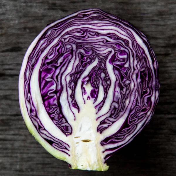 Close-up of red cabbage at a wooden background