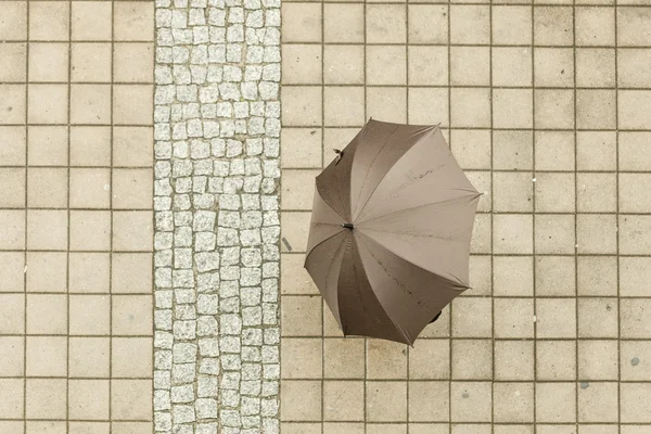 Person with umbrella.