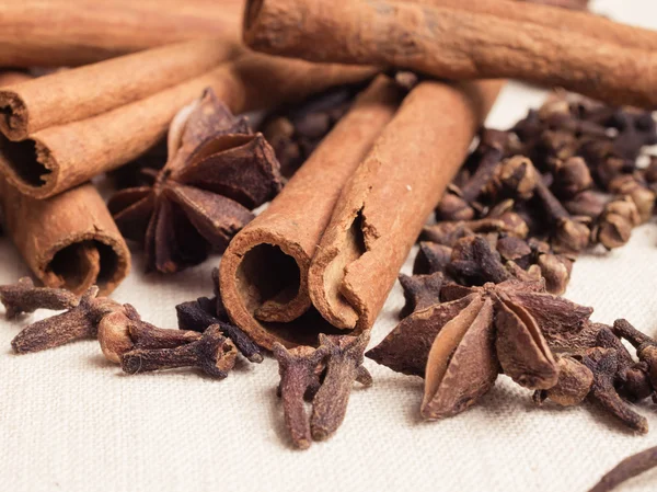 Spices cinnamon sticks anise stars and cloves — Stock Photo, Image