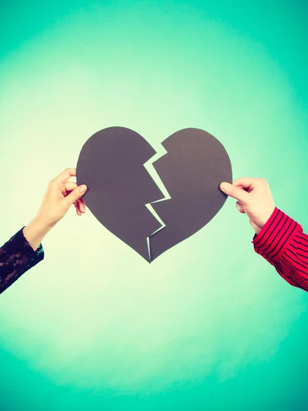 Two people fixing heart. — Stock Photo, Image