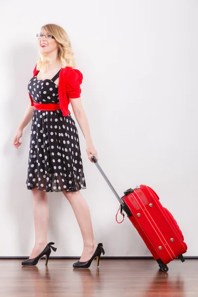 Elegant fashion woman with red suitcase — Stock Photo, Image