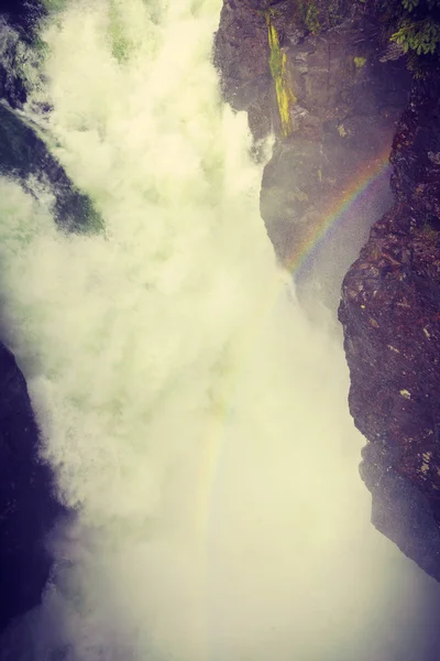 Waterfall and rainbow in mountains, Norway. — Stock Photo, Image