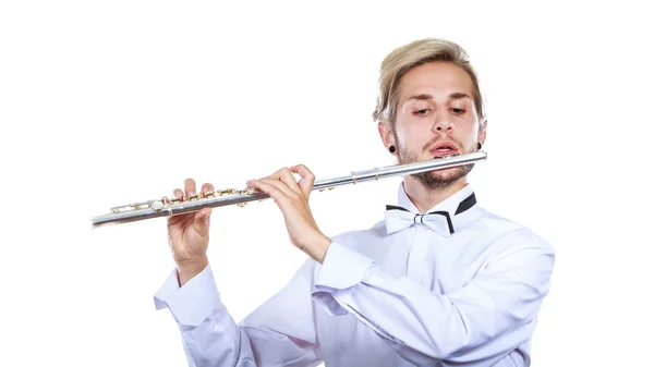 Male flutist playing his flute — Stock Photo, Image