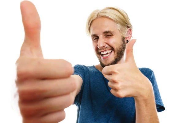 Content young man giving thumb up — Stock Photo, Image