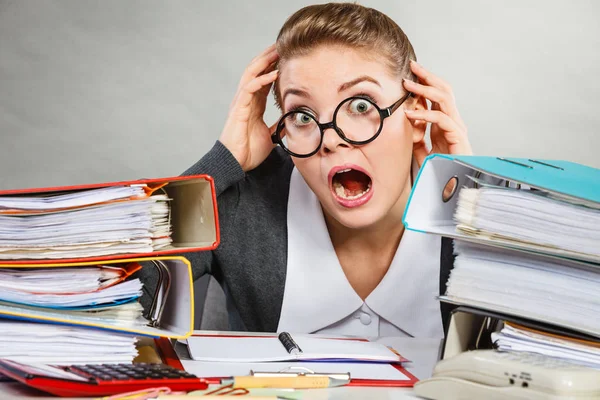 Panicked secretary at desk.