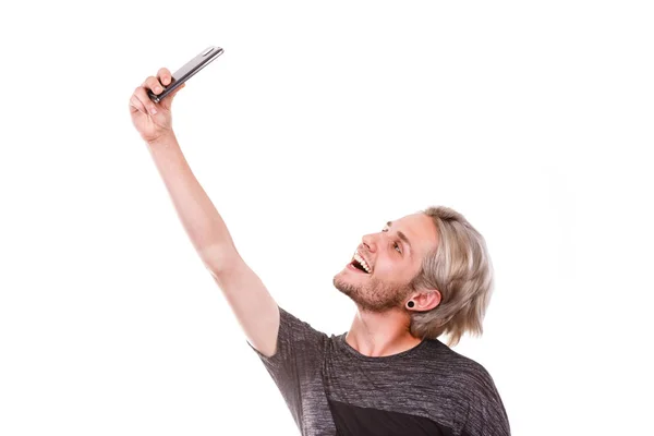 Young man taking selfie photo with smartphone camera — Stock Photo, Image