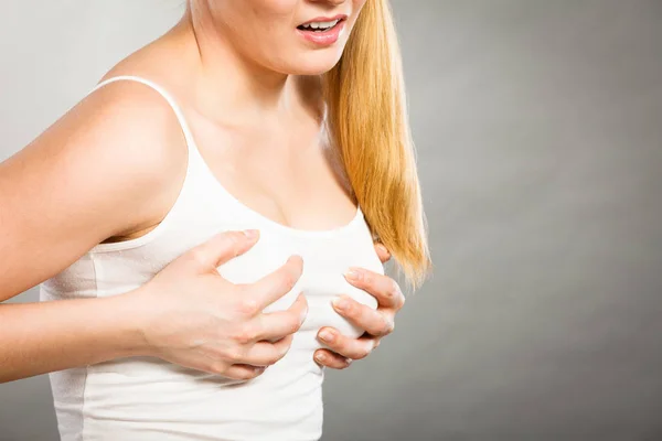 Woman suffering from breast pain — Stock Photo, Image