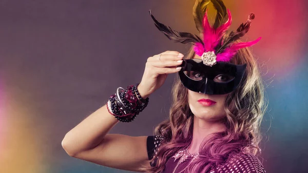 Woman with carnival venetian mask on dark — Stock Photo, Image