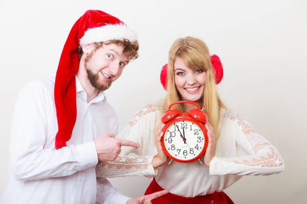 Happy couple woman and man with alarm clock. — Stock Photo, Image