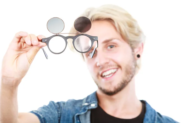 Hipster man showing eccentric glasses studio shot — Stock Photo, Image