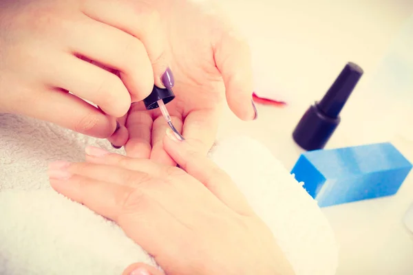 Close up of client and manicurist hands. — Stock Photo, Image