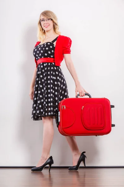 Elegant fashion woman with red suitcase — Stock Photo, Image