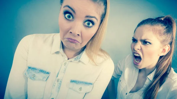 Angry fury girl screaming at her friend or younger sister — Stock Photo, Image