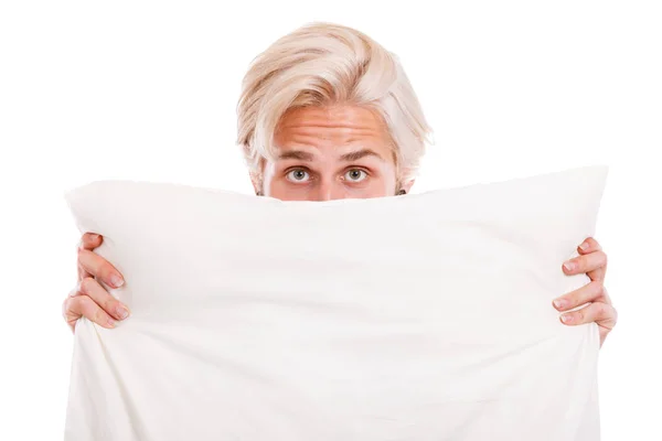 Człowiek, ukrywszy twarz z poduszką — Zdjęcie stockowe