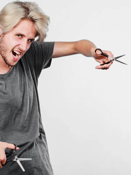 Man with scissors for haircutting — Stock Photo, Image