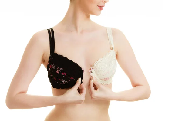 Lady with choice trying to choose perfect bra. — Stock Photo, Image