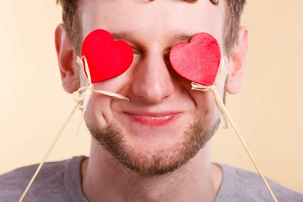 Man in love with hearts. — Stock Photo, Image
