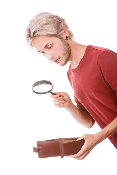 Young man with empty wallet — Stock Photo, Image