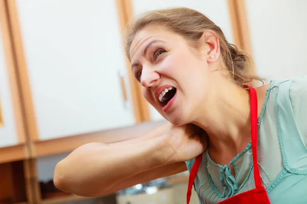 Overworked woman suffering from neck pain. — Stock Photo, Image