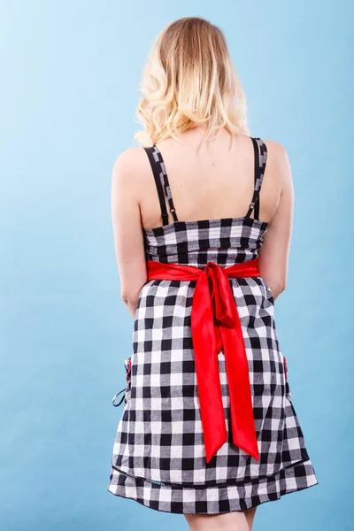 Retro checked dress with red bow — Stock Photo, Image