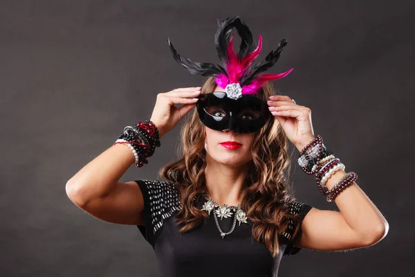 Woman with carnival venetian mask on dark — Stock Photo, Image