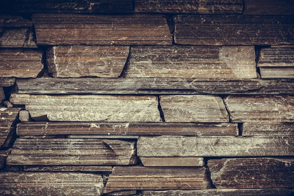 Fundo marrom de parede de pedra de tijolo — Fotografia de Stock