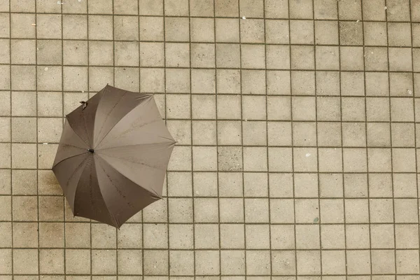 Person with umbrella.
