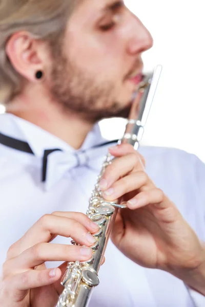 Male flutist playing his flute closeup — Stock Photo, Image