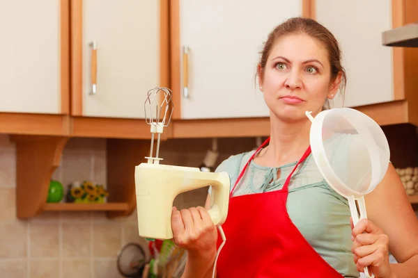 Housewife with mixer having fun in kitchen. — Stock Photo, Image