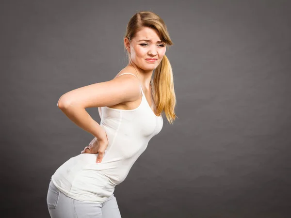 Woman suffering from back pain — Stock Photo, Image