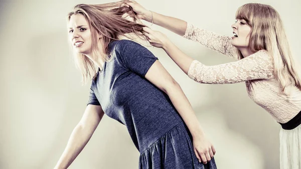 Aggressive mad women fighting each other. — Stock Photo, Image