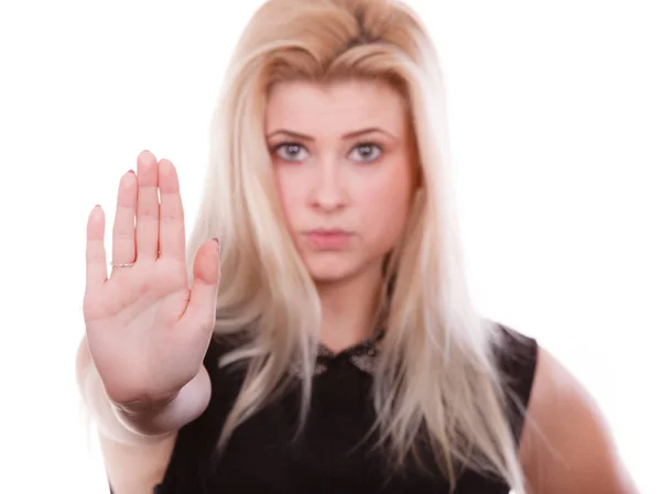 Woman making stop gesture with open hand Royalty Free Stock Photos