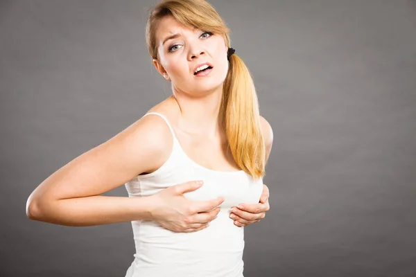 Woman suffering from breast pain — Stock Photo, Image