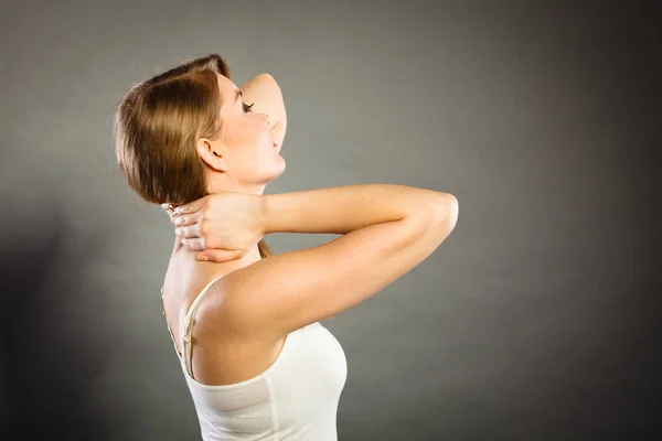 Woman suffering from neck pain — Stock Photo, Image