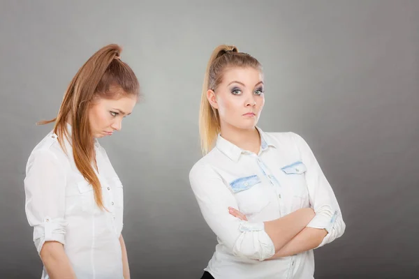 Woman asking apologize to her offended friend after quarrel. — Stock Photo, Image