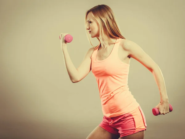 Fitness woman exercising with dumbbells. — Stock Photo, Image