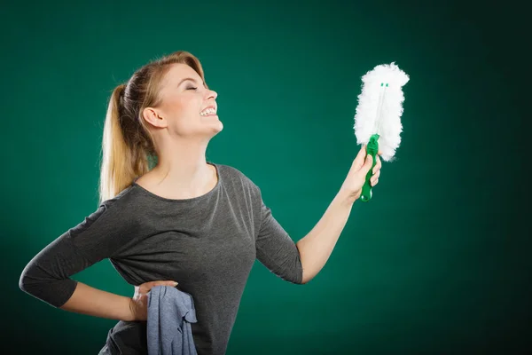 Girl with cleaning cloth in hand. — Stock Photo, Image