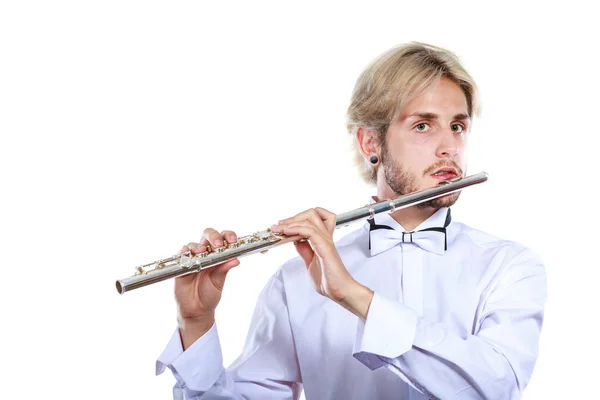 Male flutist playing his flute — Stock Photo, Image