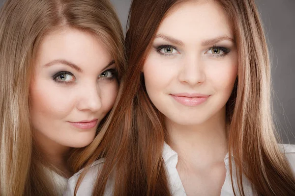 Charming positive female siblings. — Stock Photo, Image