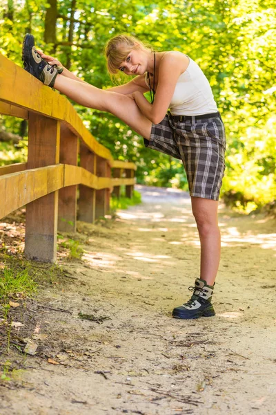 Hiker young woman in nature preparing to hike — Stock Photo, Image