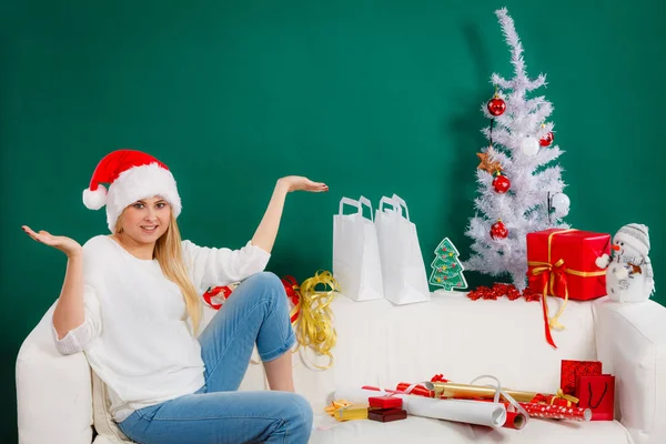 Santa christmas woman relaxing on sofa — Stock Photo, Image