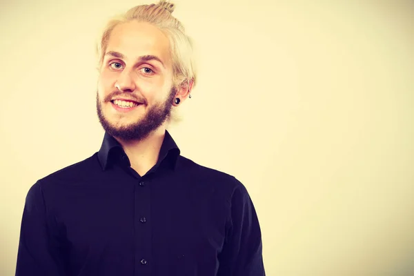 Closeup of smiling blonde man with piercing — Stock Photo, Image