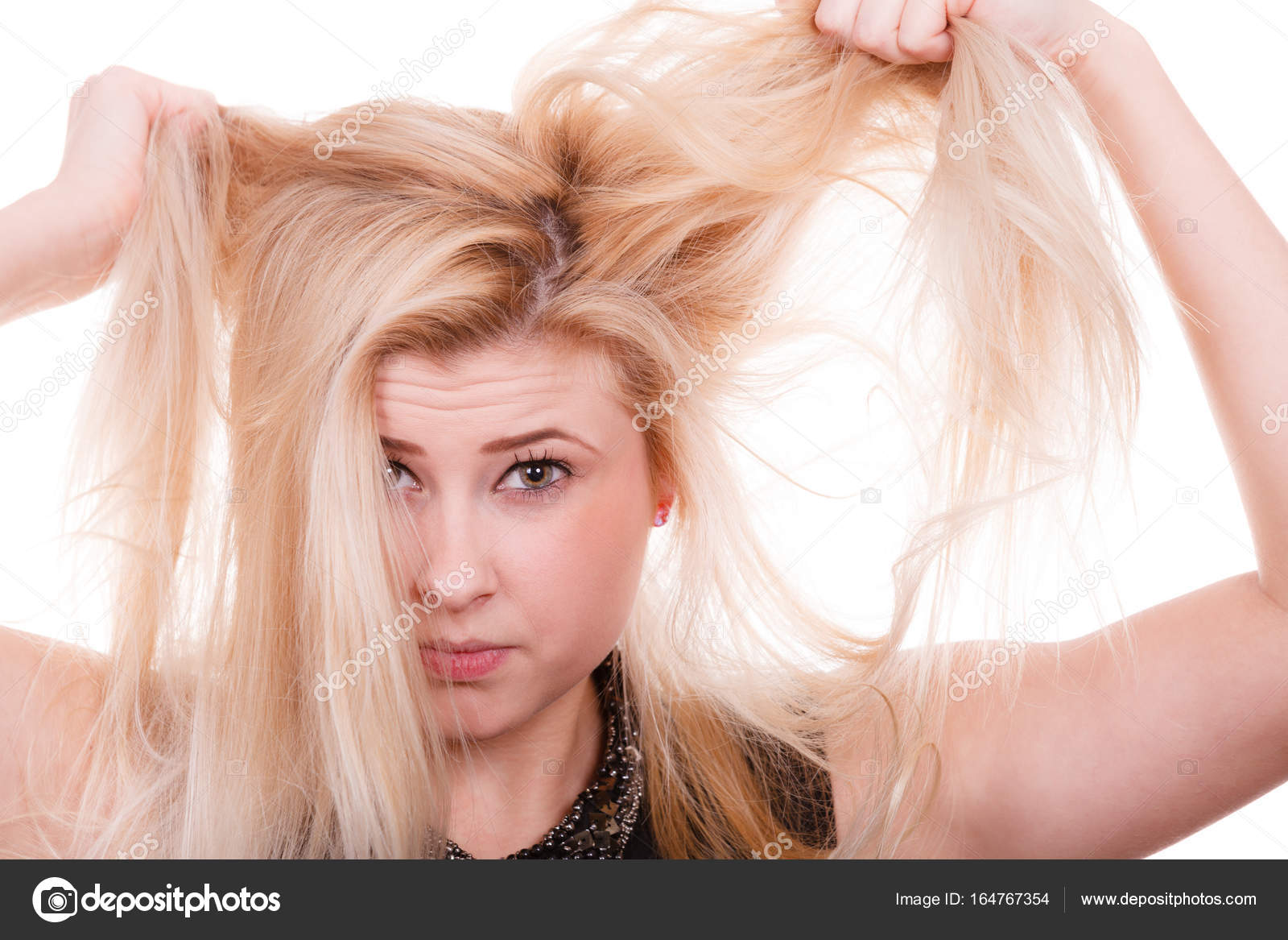 Blonde Woman Holding Her Dry Hair Stock Photo C Anetlanda 164767354