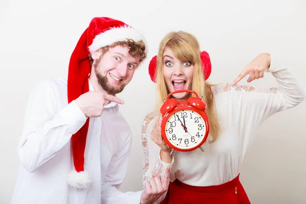 Happy couple woman and man with alarm clock. — Stock Photo, Image