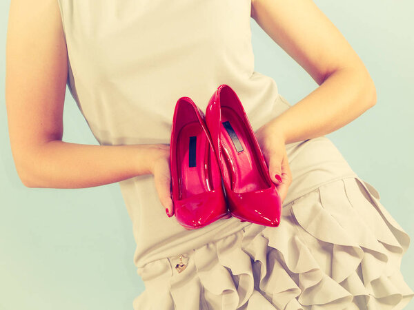Fashion stylist presenting high heels