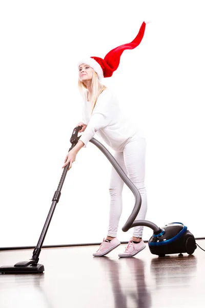 Flicka i santa helper hatt med dammsugare — Stockfoto