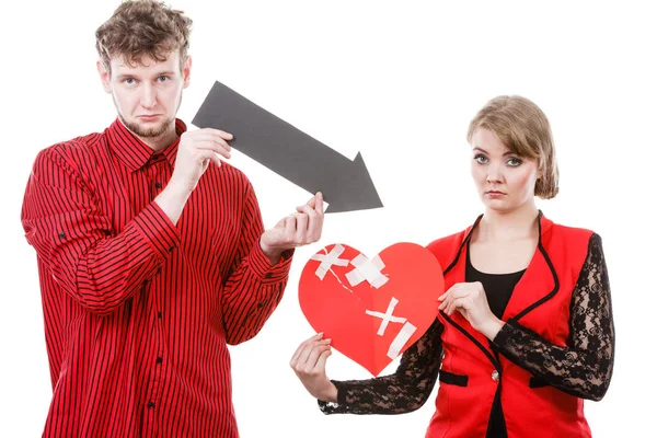 Couple holding love symbols. — Stock Photo, Image