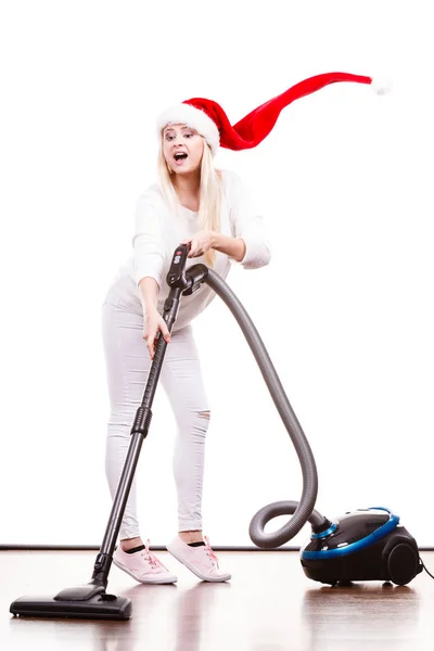 Girl in santa helper hat with vacuum cleaner — Stock Photo, Image