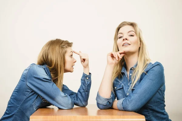 Woman mocking her confident friend — Stock Photo, Image